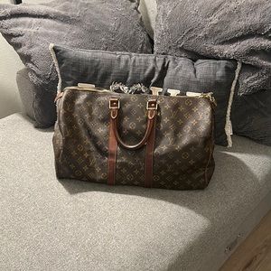 Louis Vuitton small travel/duffel bag